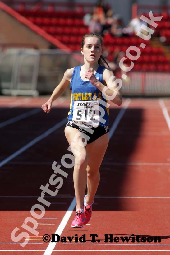 Lydia Turner (Birtley) wins the under-17s 3000 metres with a championship record.